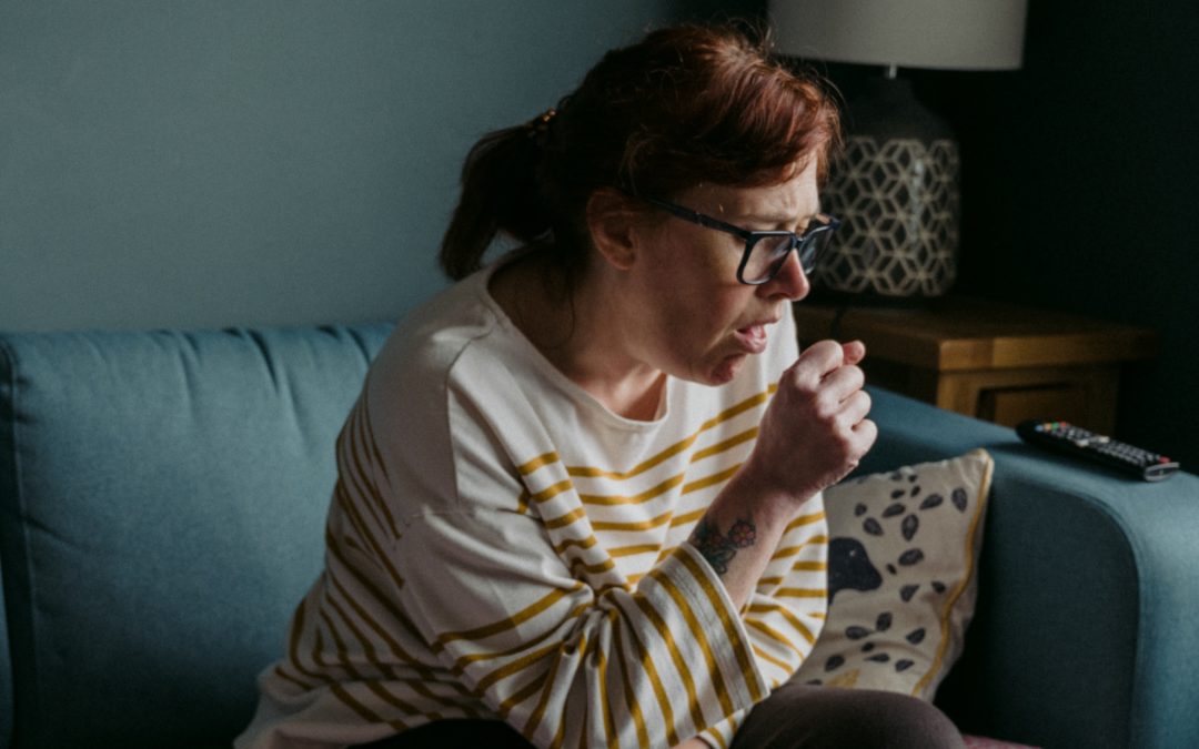 Symptoms for COVID-19, woman coughing, CDC,